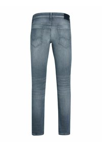 Kapehousut slim-fit vaaleansinisestä denimistä, joissa on kaksi takataskua, huomaamaton ompelu ja suora lahje puhtaalla helmapäärmeellä.