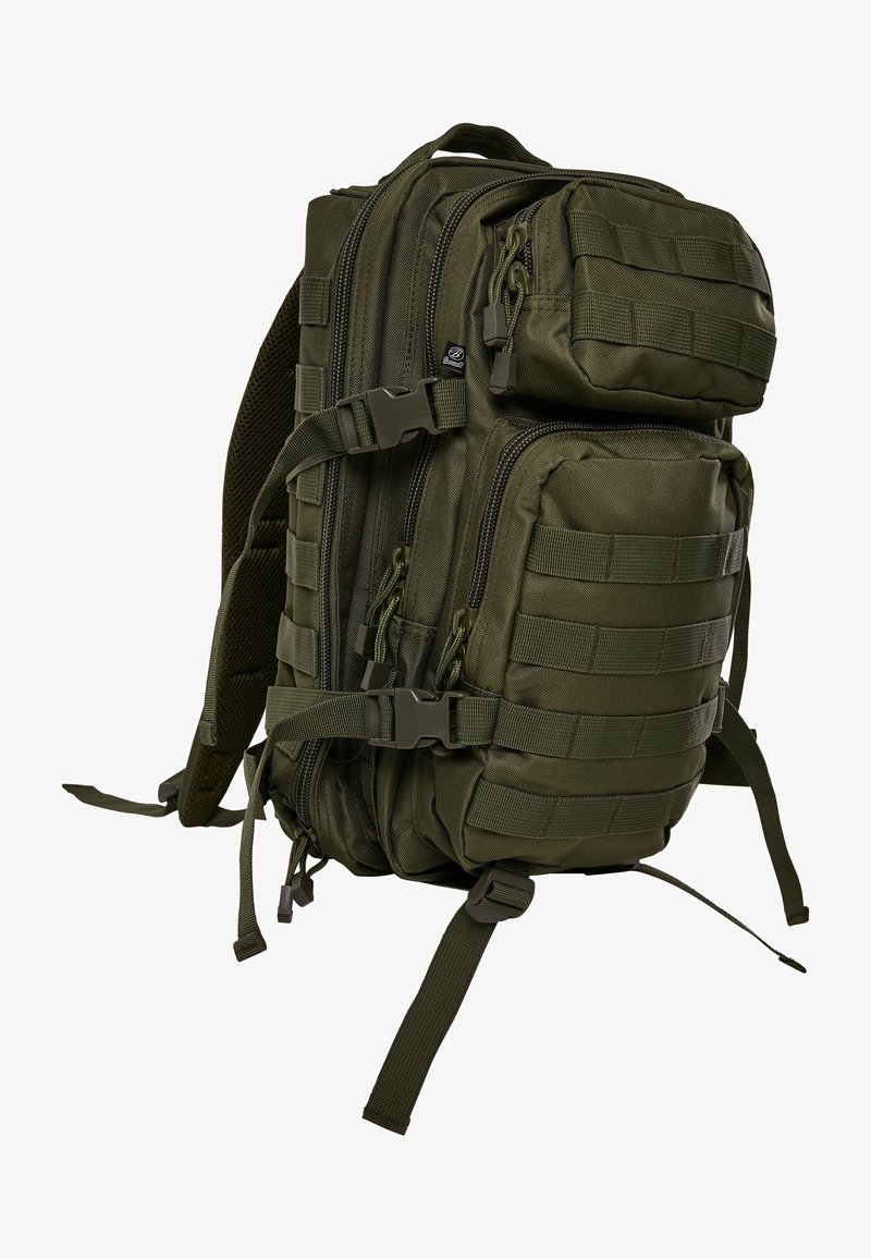 Olīvu zaļš taktiskais mugursoma ar vairākiem nodalījumiem, rāvējslēdzējiem un siksnām. Izstrādāta ar regulējamiem siksnām un teksturētu audumu.