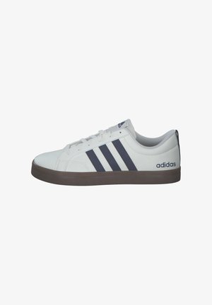 White athletic shoe with navy blue stripes, rubber sole, round toe, and lace-up design. Features "adidas" logo on the side.