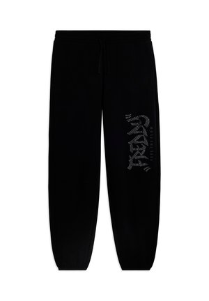 Pantaloni jogger neri con elastico in vita e polsini alle caviglie, con scritte "TREND" e "FEEL THE FLOW" sulla gamba destra.