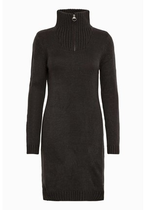 Robe pull noire en tricot avec un col côtelé haut, fermeture éclair, manches longues et ourlet côtelé. Tissu texturé avec une silhouette ajustée.