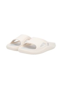 White rubber slide sandals with open toe, wide strap, and cut-out sides. Textured insole and slight raised sole for comfort.