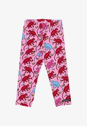 Pink leggings featuring a playful print of red and blue monkeys holding bananas, made from stretchy fabric with a soft texture.