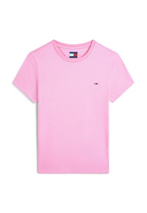 Ροζ T-shirt με κοντά μανίκια και στρογγυλή λαιμόκοψη, με μικρό λογότυπο Tommy Jeans στο αριστερό στήθος και ετικέτα μέσα στον γιακά.