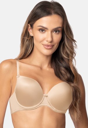 Beige gevoerde bh met een gladde textuur, onderdraad ondersteuning, verstelbare schouderbandjes en een klein decoratief strikje in het midden voor.