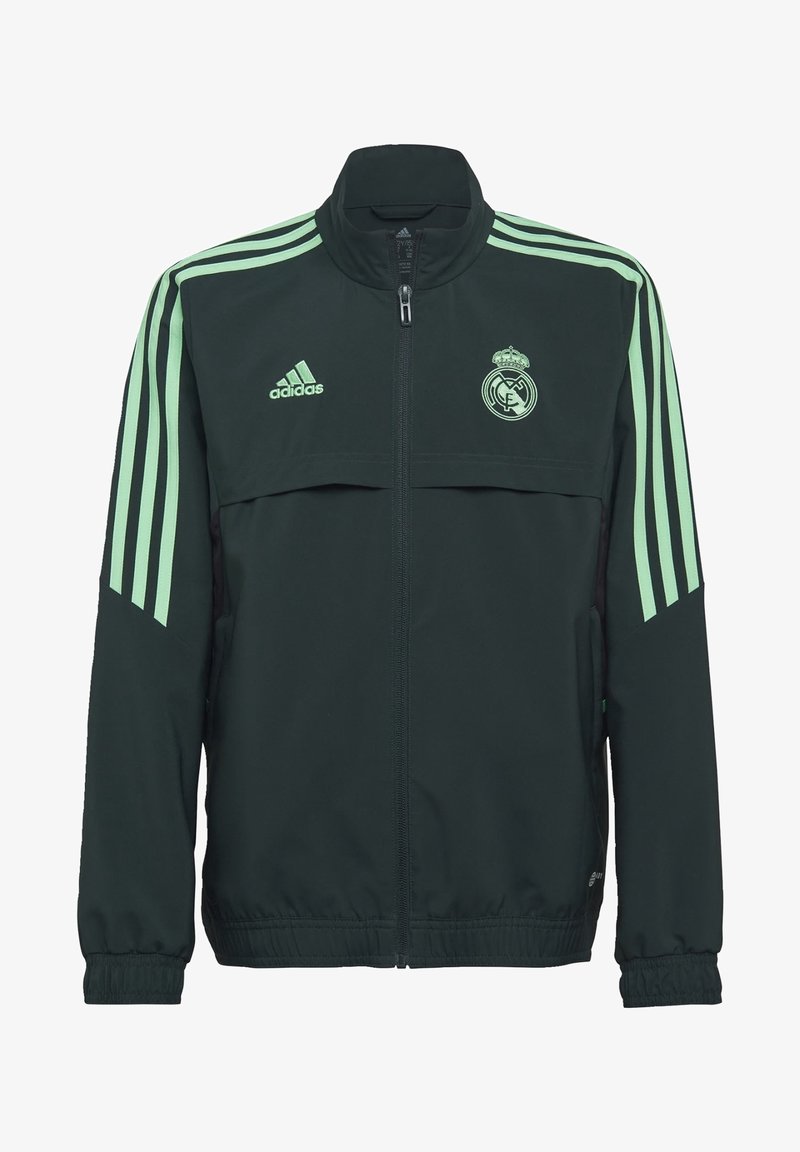 Dark green jacket with light green accents and three stripes on each sleeve. Features a high collar and Real Madrid logo on the chest.