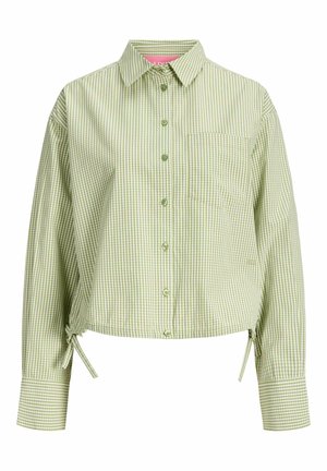 Chemise à manches longues à carreaux vichy vert clair et blanc, avec col, poche poitrine et liens latéraux réglables à l'ourlet.