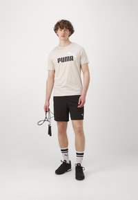 Puma ESSENTIALS - Športové šortky - black