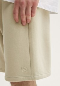TOM TAILOR DENIM Donji dijelovi trenirke - beige abbey stone