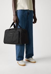 Tommy Hilfiger REPREVE DUFFLE UNISEX - Nädalavahetuse reisikotid - black