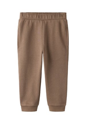 Brune småbørns joggingbukser med elastisk linning, sidelommer og ribkant ved anklerne, vist på en hvid baggrund.