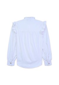 White long-sleeve shirt with ruffled accents at the shoulders, buttoned cuffs, and a smooth texture. Features a gathered back design.