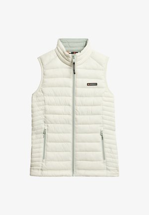 Lekki, bezrękawnik w jasnoszarym kolorze z zapięciem na zamek z przodu, subtelną pikowaną fakturą i dwoma bocznymi kieszeniami na zamek. Posiada logo marki.