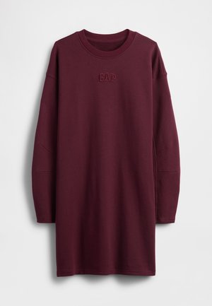 Bordeauxrotes Sweatshirtkleid mit langen Ärmeln, Rundhalsausschnitt und besticktem "GAP"-Logo auf der Brust. Weicher Stoff mit entspannter Passform.