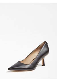 Escarpin en cuir noir avec un bout pointu et un talon mi-hauteur effilé. Texture lisse et design minimaliste. Intérieur beige.