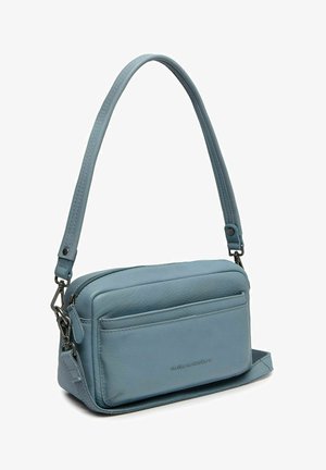 Sac bandoulière en cuir bleu avec poche zippée à l'avant, bandoulière réglable et amovible, et poignée solide.