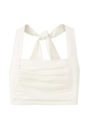 Top court blanc avec larges bretelles nouées en nœud dans le dos et plis horizontaux sur le devant.