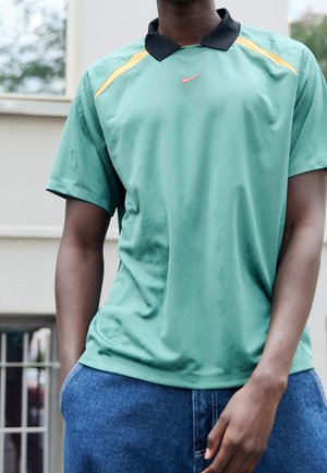 Tekninen t-paita - teal