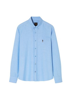 Light blue long-sleeve button-up shirt made of woven fabric. Features a classic collar, central button placket, and small embroidered bear detail.