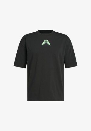 Mustapaitainen lyhythihainen T-paita, joka on valmistettu puuvillasta ja jossa on pimeässä hohtava vihreä kolmion muotoinen logo rinnassa. Rentoa istuvuutta, pyöreä kaula-aukko.