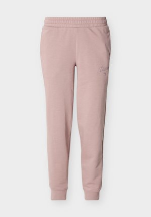 Gaiši rozā Puma bikses ar elastīgu vidukli, aprocēm potītēs un izšūtu logotipu labajā augšstilbā.