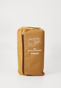 Unselected, talon gold-coloured