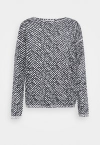 Schwarz-weißer Langarmtop mit einem gemusterten Design und variierender Strichstärke. Runder Halsausschnitt, lockere Passform und weicher Stofftextur.