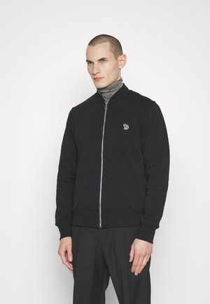 Black zip-up sweatshirt with a stand collar, ribbed hem and cuffs, featuring a small red and white embroidered logo on the left chest.