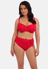 Red two-piece bikini set featuring a twisted design on the top, adjustable straps, and high-waisted bottom with a tie detail. Textured fabric.