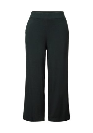 Schwarze, weit geschnittene Hosen aus einem glatten, dehnbaren Stoff mit einem elastischen Bund. Mit einem subtilen seitlichen Akzentdetail.