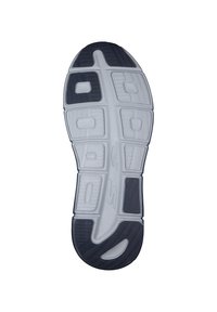 Suola di una scarpa sportiva, caratterizzata da una sezione superiore grigia con motivi in gomma bianca e nera testurizzati, progettata per aderenza e flessibilità.