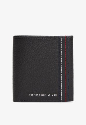 Mustast tekstureeritud nahast rahakott, millel on punase, valge ja sinise vertikaalne õmblus ning ees väike valge Tommy Hilfigeri logo.