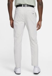 Nike Golf TOUR REPEL - Hlače - white