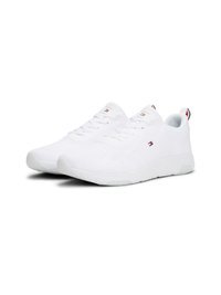 Scarpe da ginnastica bianche con tomaia in maglia testurizzata, lacci piatti, punta arrotondata e suola in gomma. Presenta un piccolo logo sulla linguetta.