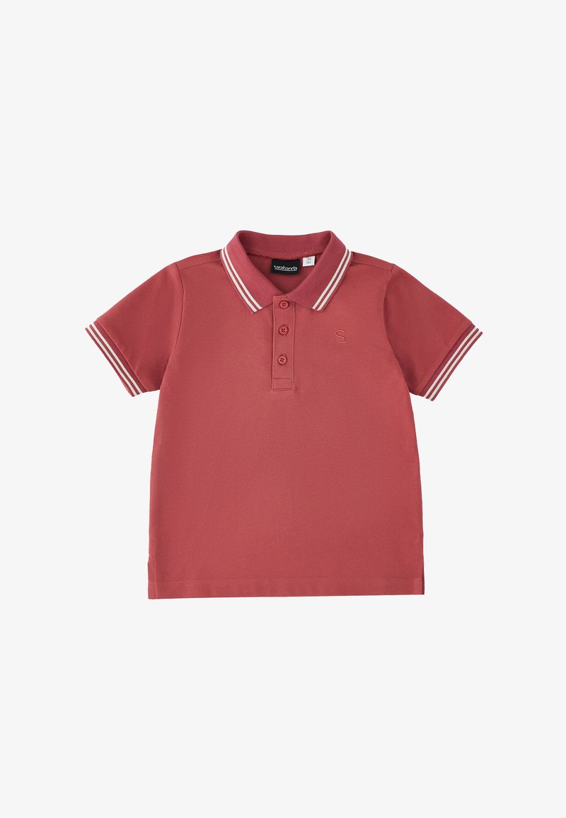 Polo à manches courtes rose poussière avec double rayures blanches sur le col et les poignets des manches, patte de boutonnage à trois boutons, et petit "S" brodé sur la poitrine.