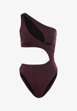 Costume da bagno intero asimmetrico in un elegante bordeaux scuro con dettagli cut-out, texture liscia e fodera nera a contrasto.