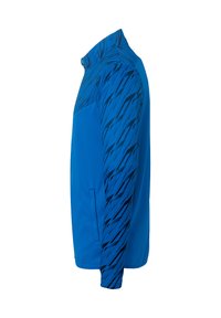 Blauw jack met een effen lichaam en een zwart abstract patroon op de linkermouw. Gemaakt van een gladde stof met zijzakken.