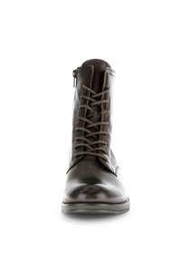 Bottine en cuir marron avec un laçage à l'avant et une fermeture éclair sur le côté. Texture lisse, bout arrondi et lacets contrastés. Semelle robuste.