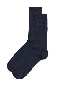 Calzini di cotone blu navy, design a coste, lunghezza a metà polpaccio, texture liscia, con punta rinforzata e polsini elastici per una vestibilità sicura.