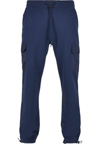 Marineblauwe joggingbroek van zachte stof, met een elastische tailleband met trekkoord en cargozakken aan beide zijkanten.