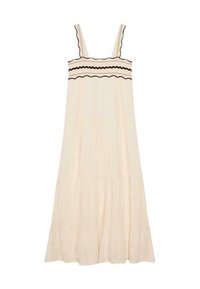 Vestido maxi en un suave tono beige claro con tirantes con volantes, costuras decorativas en zigzag negras y una falda de capas. Confeccionado en una tela suave y texturizada.