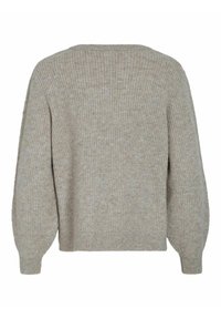 Béžový pletený svetr s texturovaným povrchem, který má volný střih, široké rukávy a žebrovaný spodní lem. Pohled zezadu zdůrazňuje jednoduchost designu.