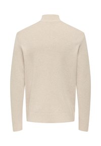 Beige sweater with a high neck, ribbed texture, and long sleeves. Features a relaxed fit and solid color with no visible patterns.