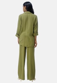 Elara SET - Broek - grün