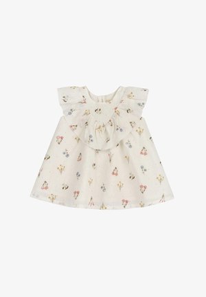 Vestido de algodón blanco con un estampado floral en rosa, azul y amarillo. El cuello con volantes y las mangas cortas aportan textura y detalle. Cierre en la parte posterior con botones.