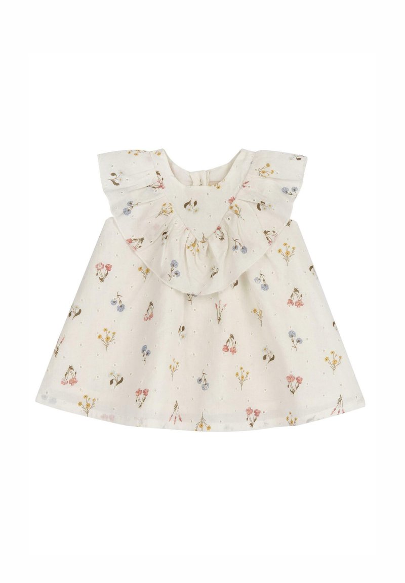Robe en coton blanche avec un imprimé floral en rose, bleu et jaune. Un col froncé et des manches courtes apportent texture et détail. Fermeture à boutons dans le dos.