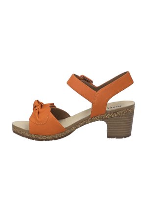 Orange leather sandal with a knotted toe strap, adjustable ankle strap, and a cork-textured heel. Textile footbed with light cushioning.