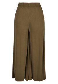 Pantalon marron à jambe large avec taille élastique et poches latérales, en tissu doux et fluide.