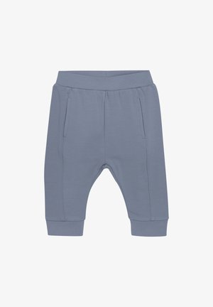 Lichtblauwe jersey joggingbroek met een elastische tailleband, zijkanten zakken en boorden bij de enkels. Gladde textuur en ontspannen pasvorm ontwerp.