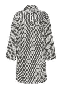 Juodai baltas raštuotas tunikas su apykakle, ilgomis rankovėmis ir mygtukų uždarymu. Jame yra geometrinių formų ir laisvas siluetas.